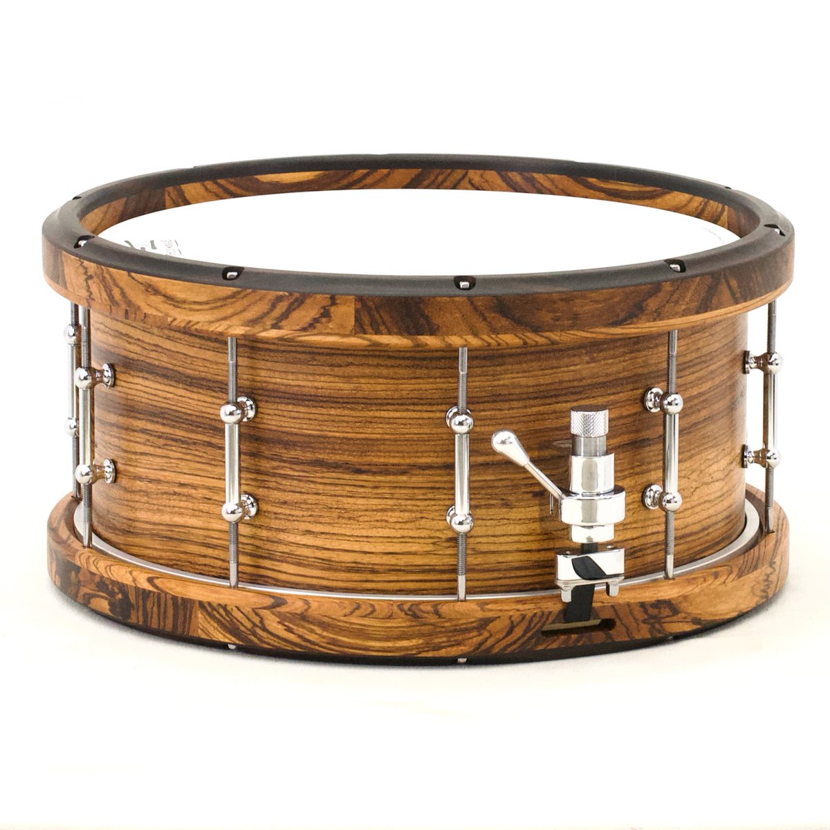 TreeHouseDrums's tweet photo. 1-ply solid Zebrawood shell with solid (segmented) Ebony-over-Zebrawood hoops make this stunner of a snare the life of the party in Ashkelon! 6½x14; solid 1-ply Zebrawood; satin wax. https://t.co/Y6rT0utq46