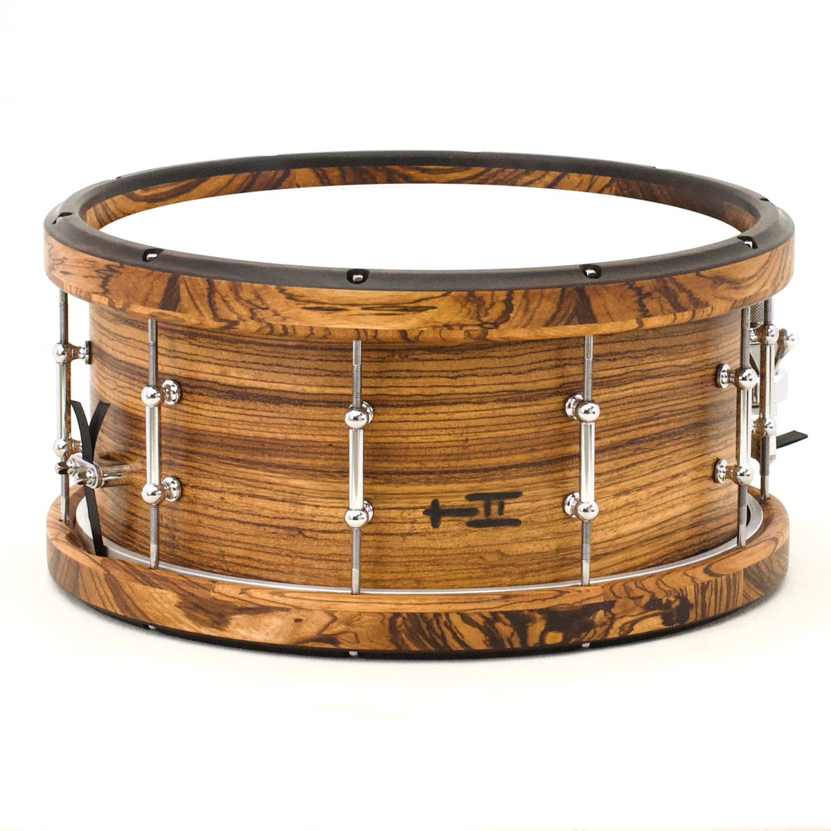 TreeHouseDrums's tweet photo. 1-ply solid Zebrawood shell with solid (segmented) Ebony-over-Zebrawood hoops make this stunner of a snare the life of the party in Ashkelon! 6½x14; solid 1-ply Zebrawood; satin wax. https://t.co/Y6rT0utq46
