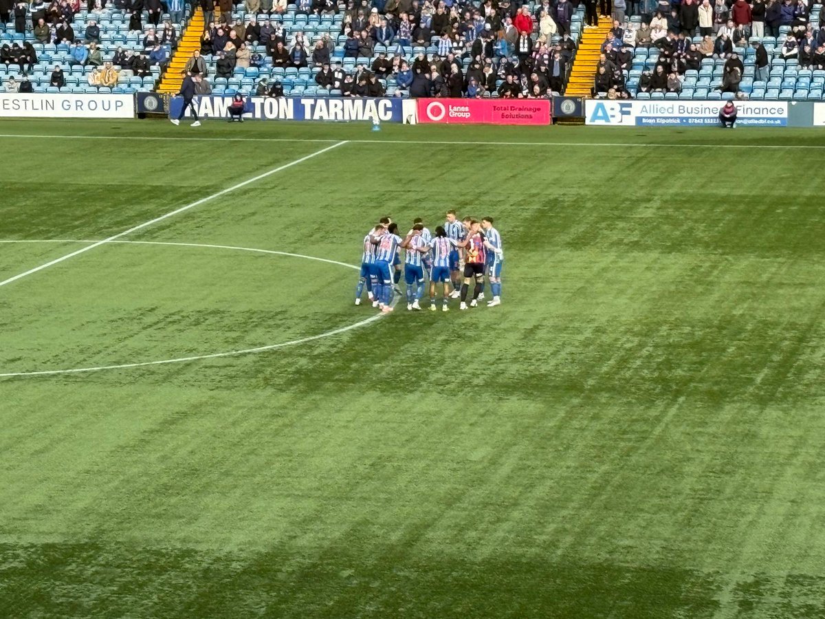 killiechronicle's tweet photo. 💻 In post for Kilmarnock v Dundee at Rugby Park. 

Let's hope this is the last game on the hallowed turf...

The 'huddle' appears for the third game in a row 🫂

90-minutes from safety, 'mon the Killie 🔵⚪️ https://t.co/rtcNFnwnYD