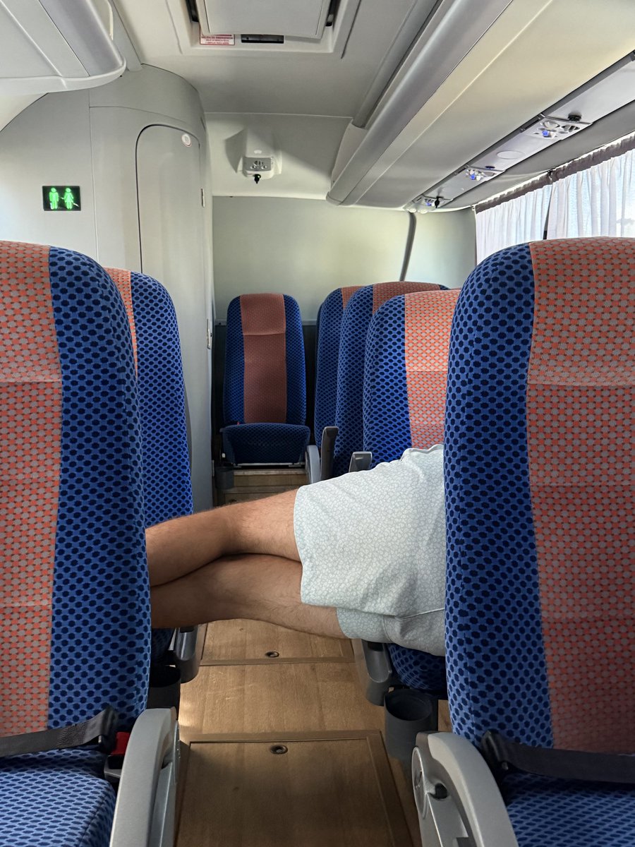 CPrishel's tweet photo. Просто чувак решил поспать в автобусе по пути в аэропорт, перекрыв всем проход в туалет. This is Mexico, baby! https://t.co/Wj652BXyAm