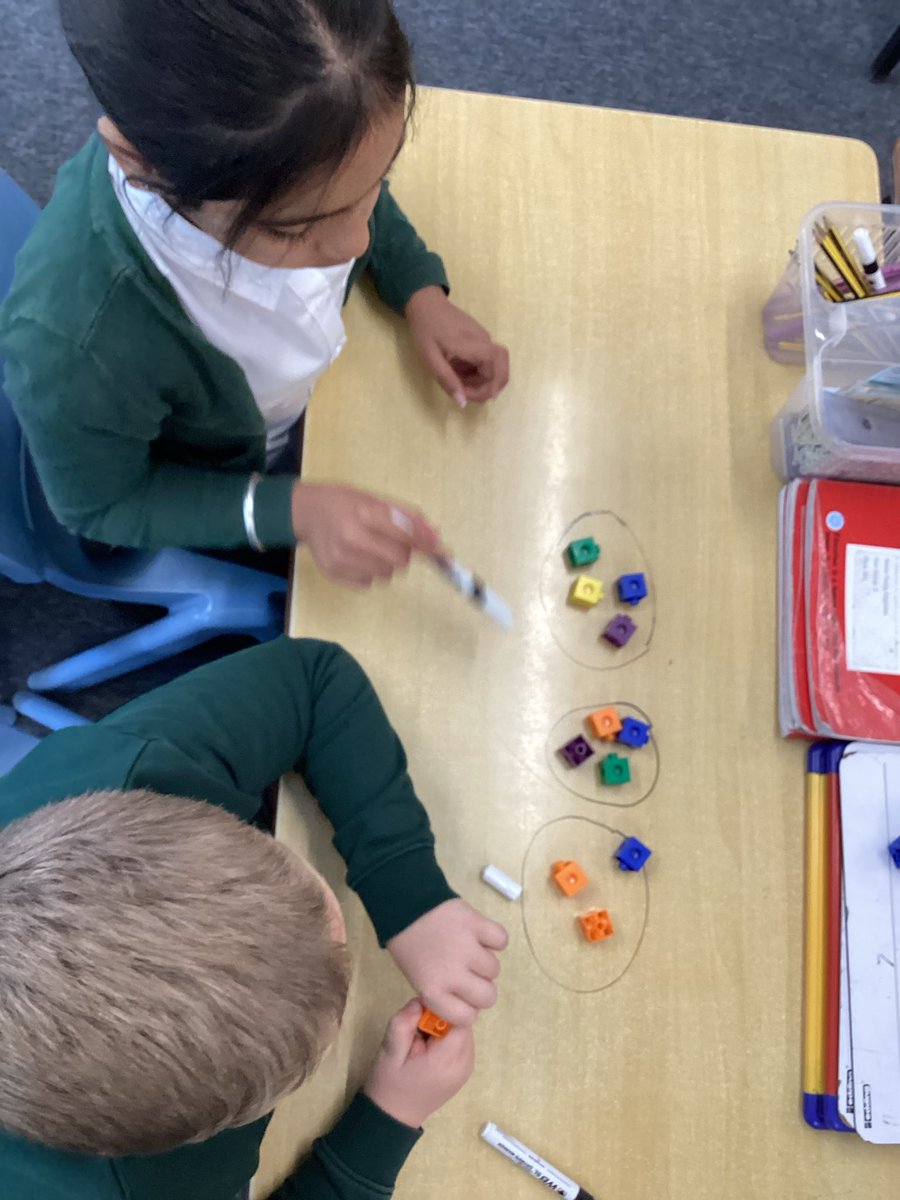 BentleyWestWS2's tweet photo. Year 3 have been practically finding fractions of amounts, sharing the cubes and being ‘naughty’ writing on the tables! #BWMaths https://t.co/e996ynpuFB