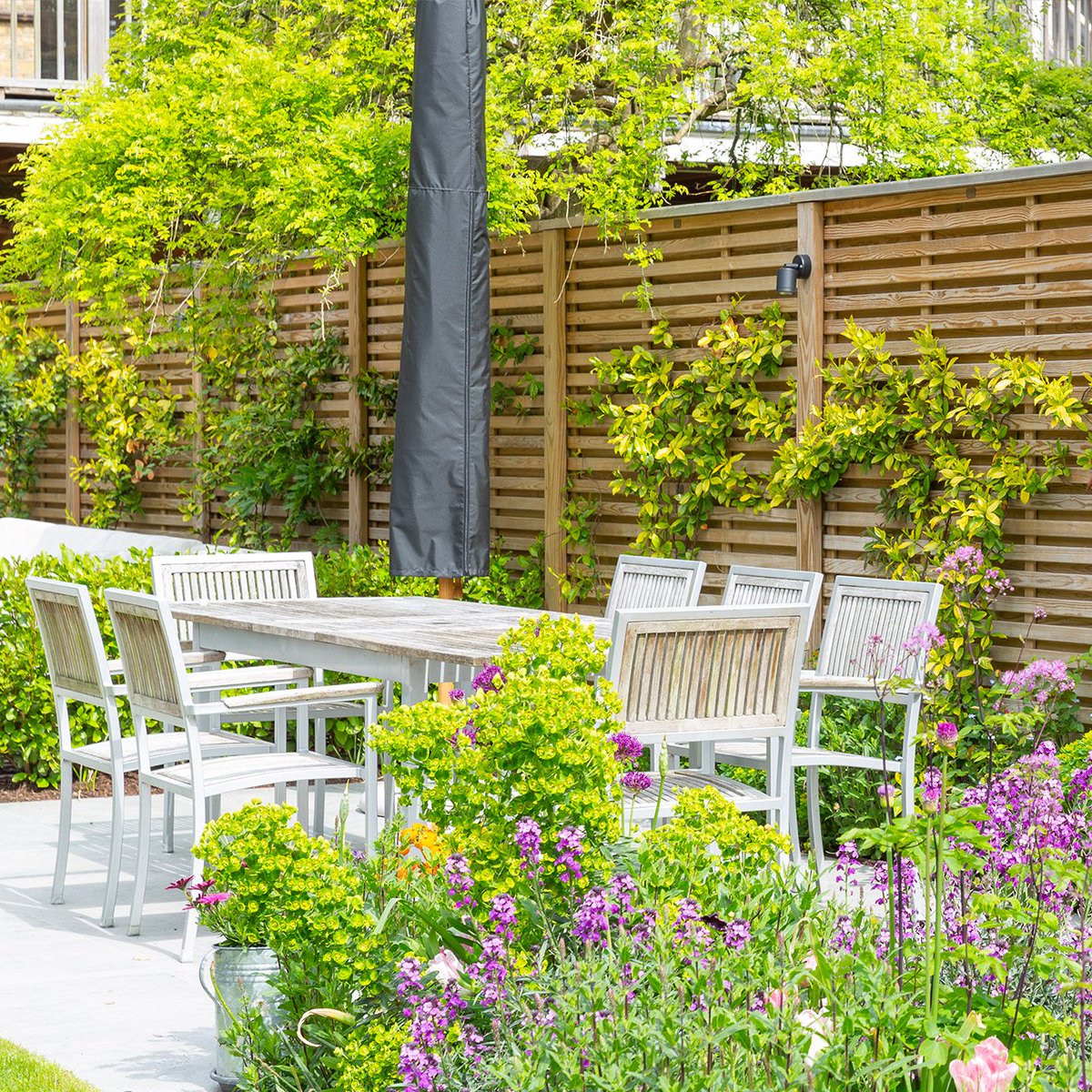 Jacksonsfencing's tweet photo. Unpredictable weather doesn’t mean you have to abandon your alfresco dining dreams. 

In our blog, we explore a range of ideas to help inspire upgrades for getting  your outdoor space ready for summer: https://t.co/hpW89BR5nL https://t.co/MmABpqvRUv
