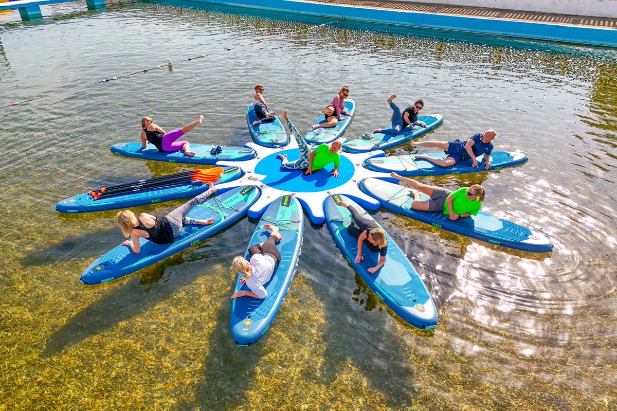 SNAPczapp's tweet photo. Jo Styles of Hello Outdoors leads a workout class called SUP Fit at Lymington Sea Water Baths, Hampshire. The unique class, which lasts an hour, was the first of the year and held in the sunshine. 
 
SUP Fit is an exercise routine on the water.   #fitness #SUP  @snapagency https://t.co/bh9UkYtBYM