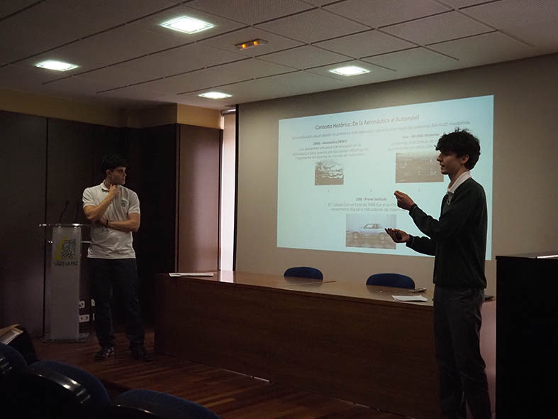 jacastelao's tweet photo. Pablo Castelao y Alejandro Lago presentaron su proyecto “Asistentes visuales en vehículos” en el que diseñaron y programaron en Phyton una aplicación para que una cámara situada en un vehículo avise acústicamente sobre la proximidad de un peatón u obstáculo en la carretera. https://t.co/Mf8GOAf8Yj
