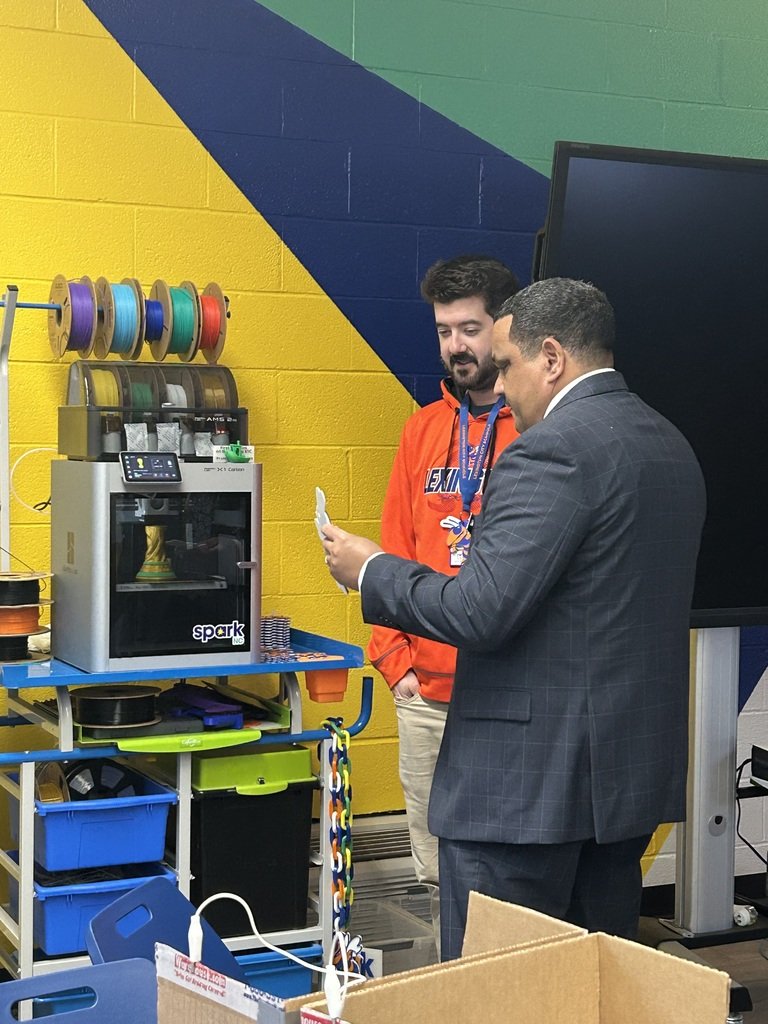 LCSJackets's tweet photo. Dr. Ron Anthony recently visited Lexington Senior High School, toured the Spark Lab, and personally sponsored a student’s upcoming field trip to Dave & Buster's after learning the student faced a financial barrier to participation. 💙🧡 #ThriveInTheHive https://t.co/gVlCbbEYu8