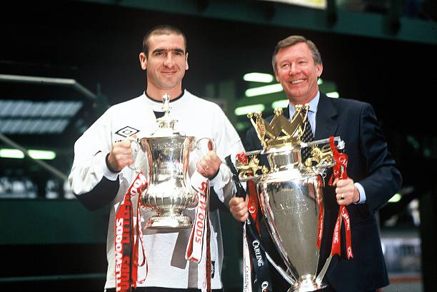 Cantona_Collars's tweet photo. 30 years ago today.

Cantona. Ferguson. Umbro. Sharp.

Manchester United completing the Double and looking cooler than any club on earth. https://t.co/wJx5iiNVxF
