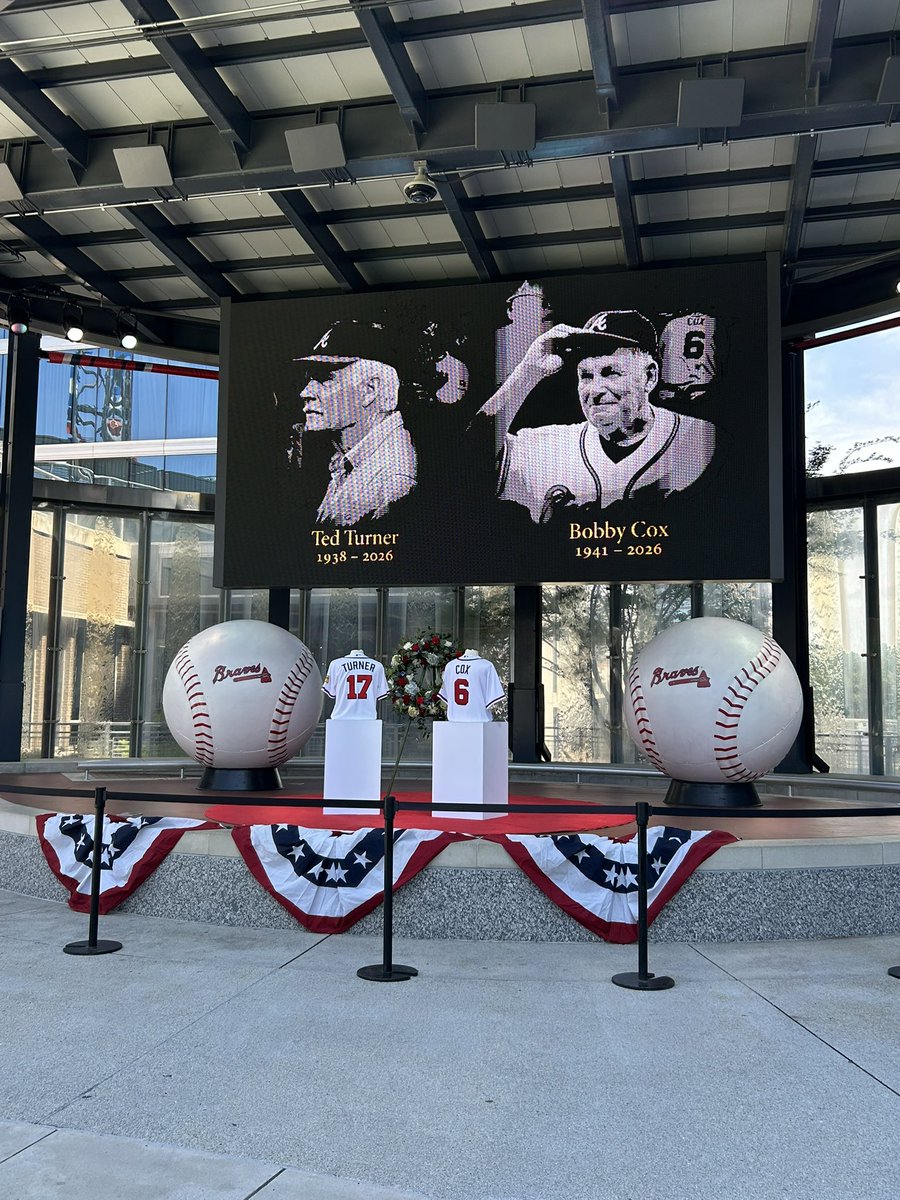 A display has been set up on the stage in The Battery outside Truist Park to honor both Ted Turner and Bobby Cox