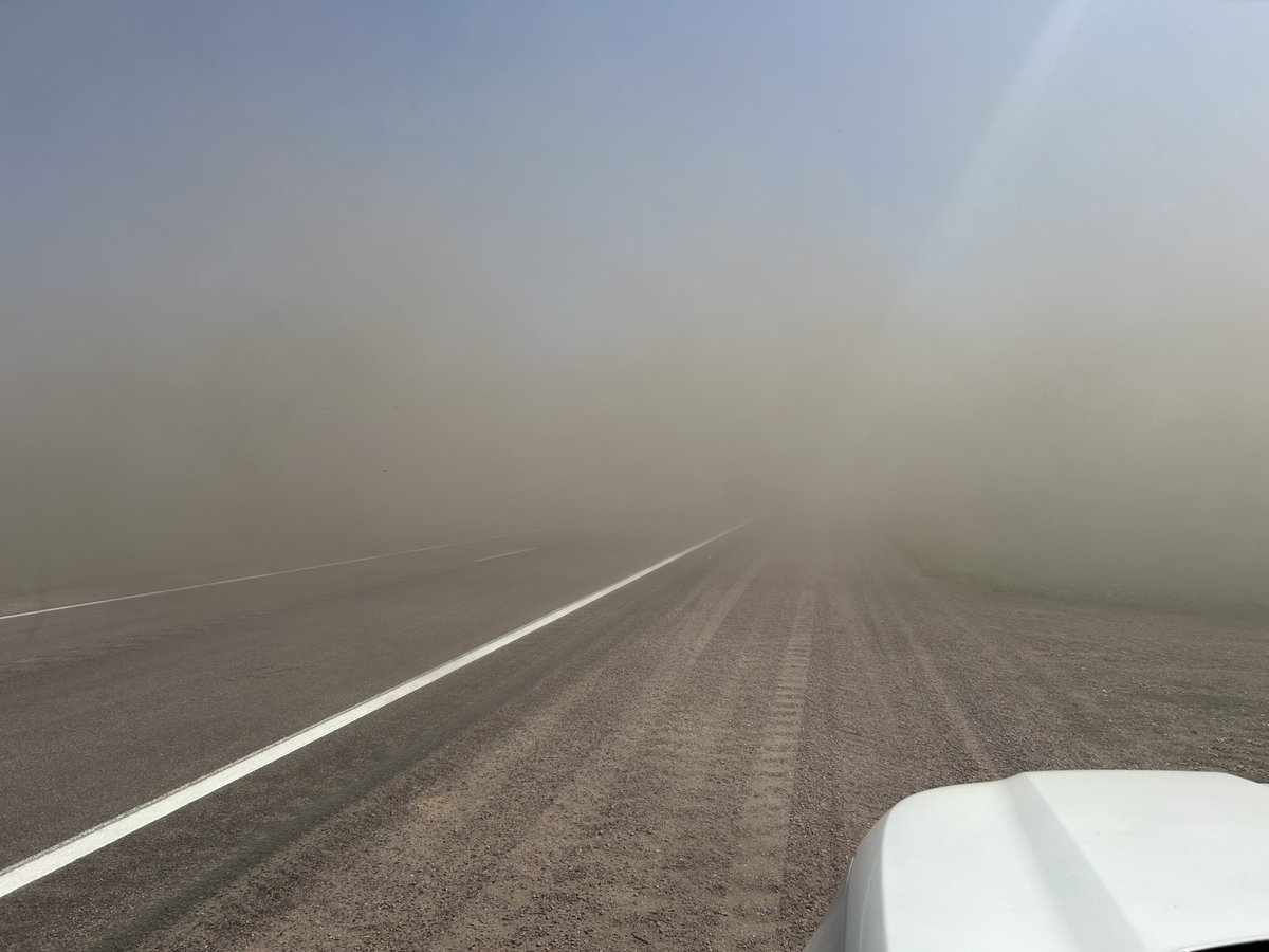 mndotscentral's tweet photo. Highway 15, north of Madelia and east of Hanska – Gusty winds and dry soil are creating areas of blowing dust and low visibility. Please slow down, use caution, and manually turn your headlights on if you are traveling in this area until the strong winds subside later today. https://t.co/3SbVTWKD2X