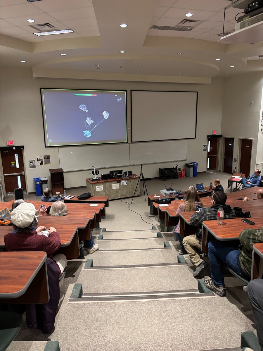 RASC_Winnipeg's tweet photo. Watching the Artemis 2 splashdown livestream at the April 2026 RASC Winnipeg monthly meeting. https://t.co/AW3p9o3yeW