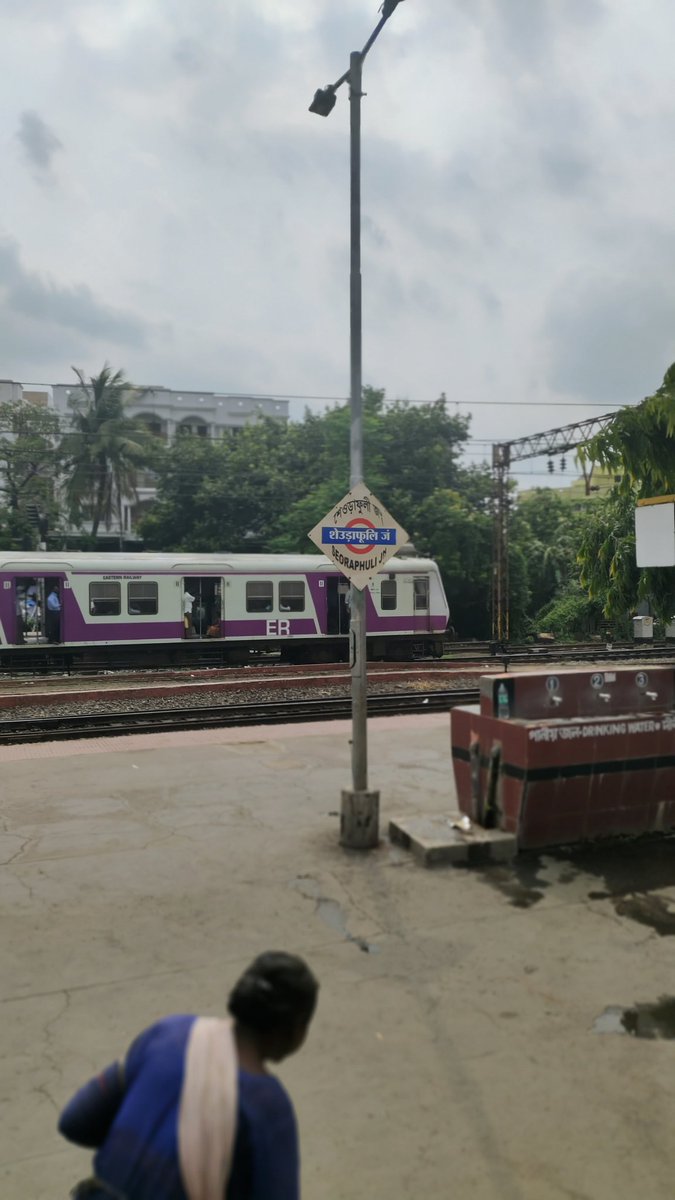 satrajit_hui's tweet photo. @RailMinIndia @RailwaySeva Travelling through W.B local trains, I noticed boards in the platforms where Hindi is placed in the middle in bold while Bengali - the local language -  appears smaller on the top. Reason ? https://t.co/OpOP5bRxAb