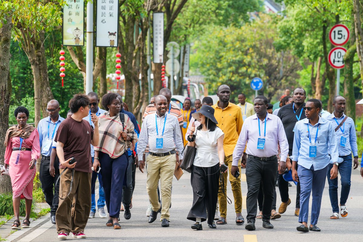 RuianChina's tweet photo. At the Chinese Wooden Movable-Type Printing Exhibition Hall in Dongyuan village, #Ruian, Burundian media professionals experienced wooden movable-type printing, opening a wordless China-Africa cultural dialogue. https://t.co/T2GjbbkG4r