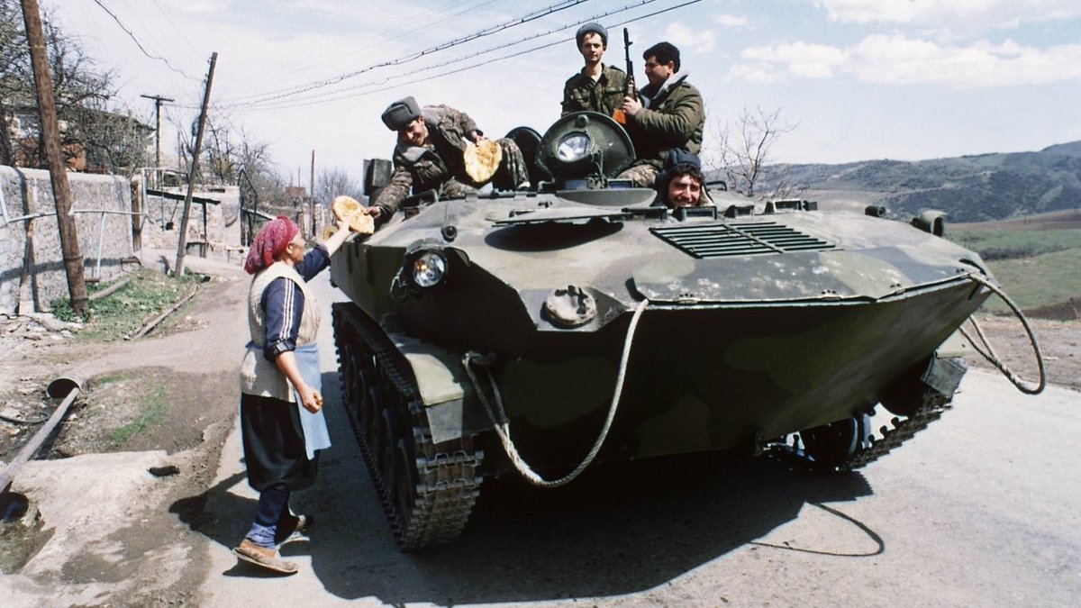 dongruzone's tweet photo. Azeri soldiers aboard a BTD-D heading towards the frontline in Khanlar district. First Nagorno-Karabakh War, 1993. https://t.co/AC03zf4jRx