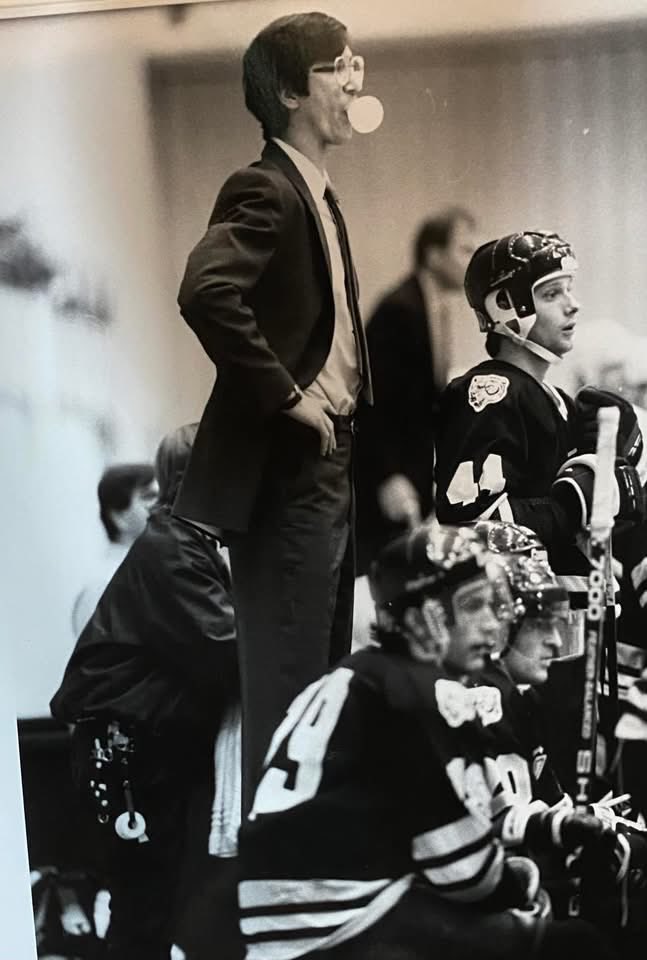 steve_carlson17's tweet photo. Photo of my coaching days with Johnstown Chiefs, gum chewing and blowing bubbles kept me from yelling at the referee, for the most part. 

When I think about it, what a ride it’s been.
WCCO all state team,  high school to semi pros in Marquette.
Then to pro with the Johnstown Jets where 
at 19 my life was put on the big screen as an actor in Slap Shot, 
That’s just a start.