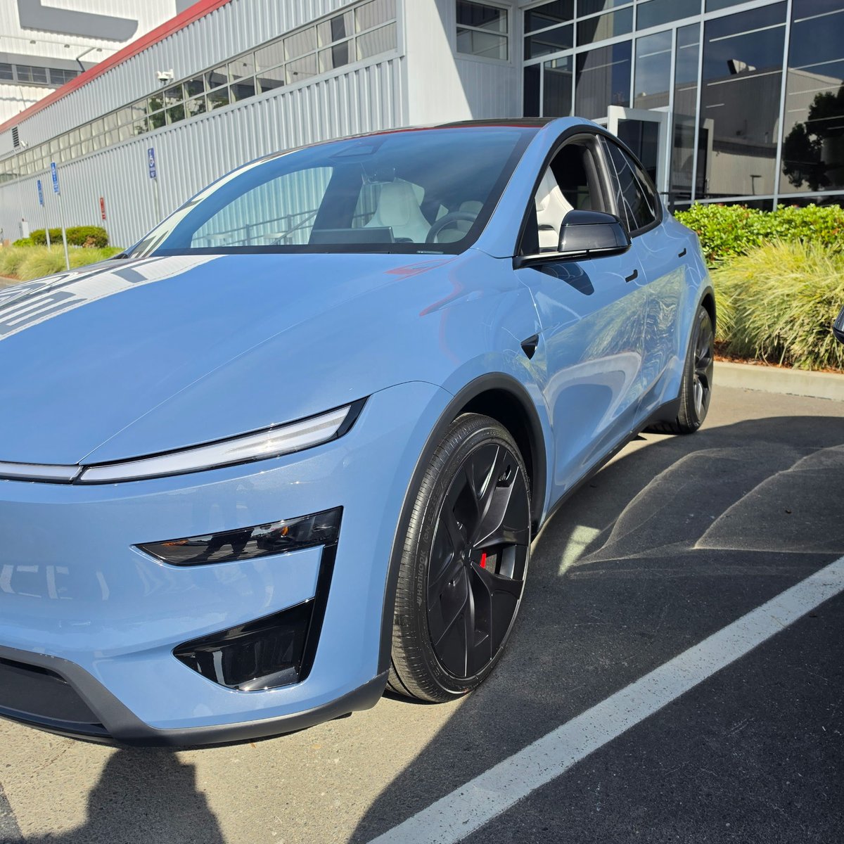 The Tesla Newswire tweet media