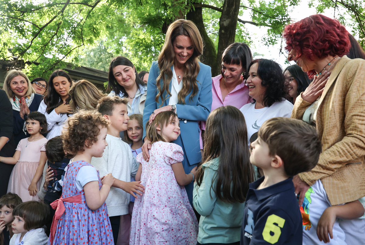 TomiLolaMoments's tweet photo. They say she did not raise her kids, that she ordered nannies all over the place. But her actions speak otherwise. Children all over the world flock around her, and she nurtures them like an experienced mother with maternal instincts.  #PrincessCatherine https://t.co/Q9dgub7BG5