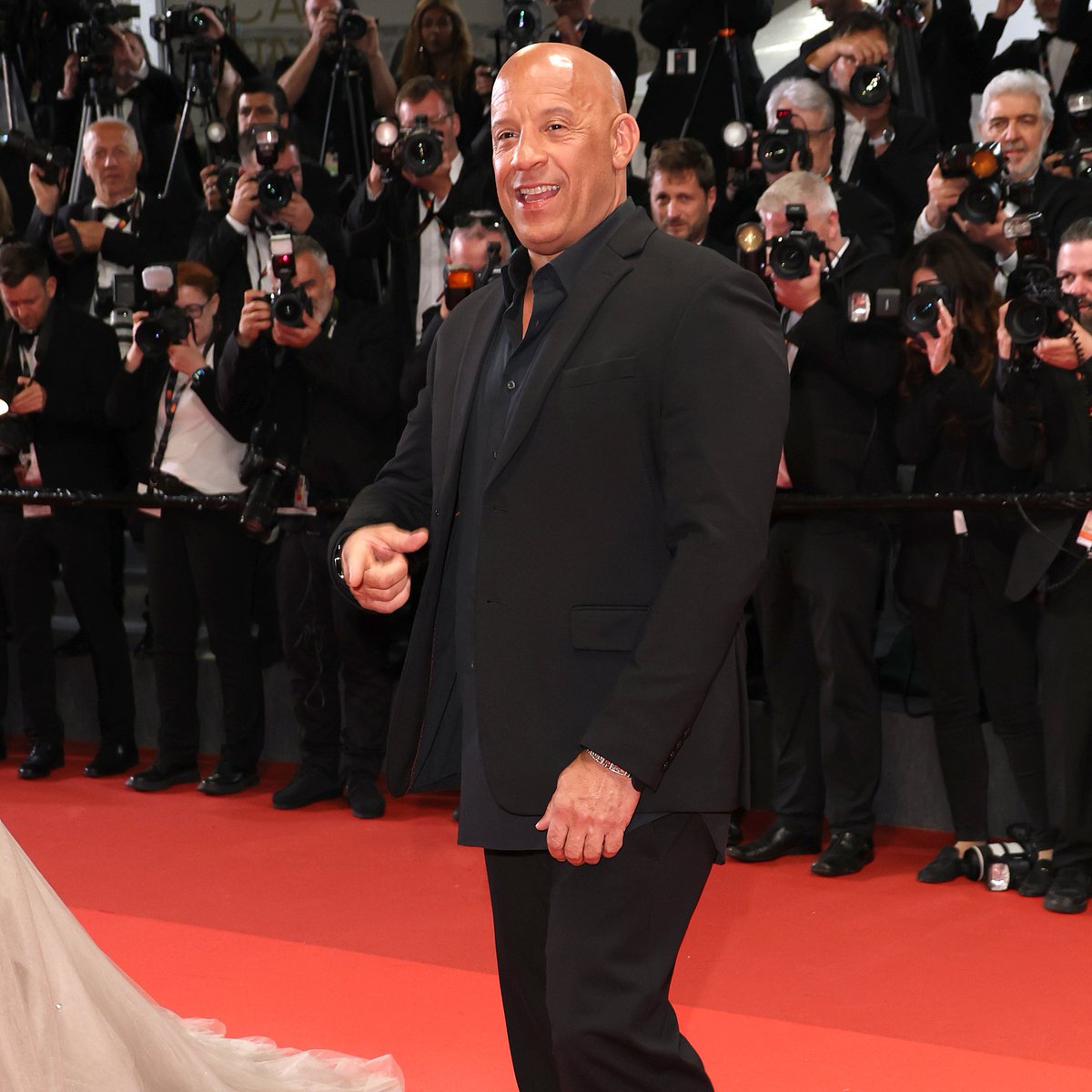 Variety's tweet photo. Vin Diesel rocks a diamond-encrusted “Fast Forever” jacket at the #Cannes screening of “The Fast and the Furious” https://t.co/xrxGxkWPTT