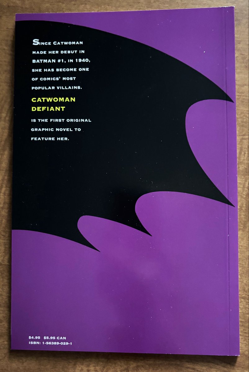 CanaDaBear1701's tweet photo. When I bought this 34 years ago it was the first original graphic novel featuring her. A must-buy given how big a fan I am of hers. 
"Catwoman Defiant" written by Peter Milligan, with art by Tom Grindberg and Dick Giordano. Stunning Stelfreeze cover.
#MyComics https://t.co/mSwt5C2UFL
