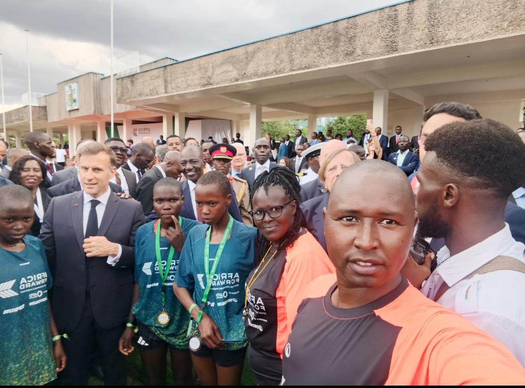 harridee's tweet photo. A selfie at the Africa Forward Summit shows Hillary Kanda beside His Excellencies Emmanuel Macron and William Ruto.

What it does not show is the journey from a dusty school field in Kondabilet to that moment.

Read more:
https://t.co/QMvlYhuJ8b https://t.co/NTWDERBJa9