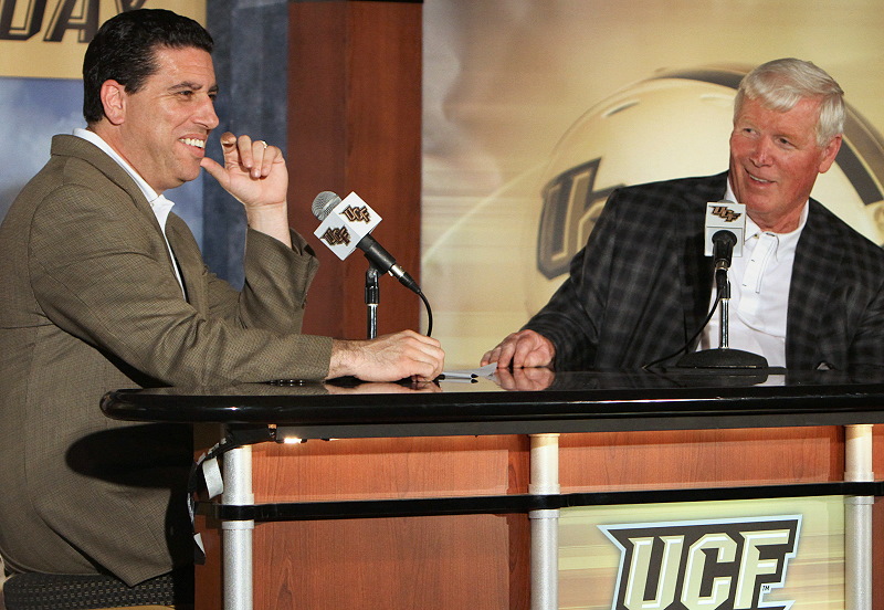UCFSports's tweet photo. Happy Birthday, Marc Daniels (@ucf_marcdaniels)!

This upcoming season will be his 32nd as the Voice of the Knights. 

Hope you had a great day!

Here's an excerpt from a story in the 1999 UCF Football Yearbook, written by Scott Wallin:

Marc believes in UCF’s ability to grow. It’s been said Daniels has enough talent to leave the Orlando market and climb his way to the top. But UCF helps keep him here. He’d like to continue his relationship with the school and one day, as he puts it, “open the media guide and read ‘now entering his 20th year as voice of the Golden Knights...’”

“I could go somewhere else, not that everyone’s knocking, but I look at it this way: with UCF, I’ve had the chance to broadcast games at Lincoln, Neb., at Auburn, Ala., South Carolina, Ole Miss, Georgia Tech and the great season that comes up in ’99,” Daniels said. “In basketball, I’ve been to the NCAA Tournament, I’ve done games at Michigan State in packed houses, I’ve done games at Florida. That’s as good as it gets.

“The thing I love about UCF is there are still so many firsts out there: the first big football win, that first bowl game, that first big basketball win that’s going to come at someplace to get back to the tournament.”