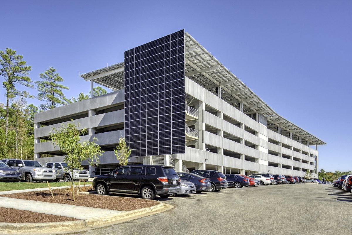 GCPCI's tweet photo. The Lenovo Parking Garage design team replaced metal panels with a precast concrete solution as an architectural feature to help the structure reflect the verdant setting of the 67-acre campus it was located on. View the full project profile at https://t.co/zCYkaheGYB https://t.co/LGhyl2WuMz