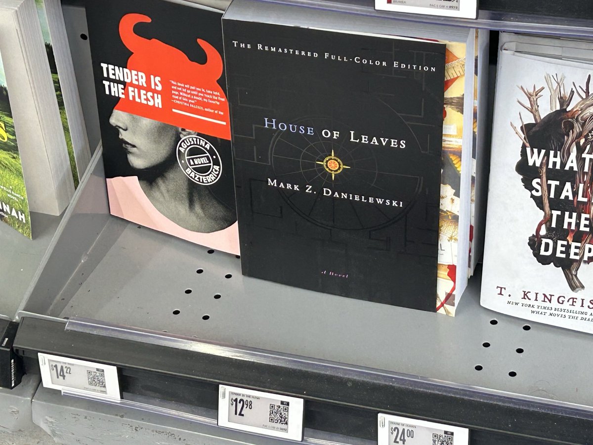 pat____smear's tweet photo. Cursed Walmart bookshelf https://t.co/4K5Lx9x5My