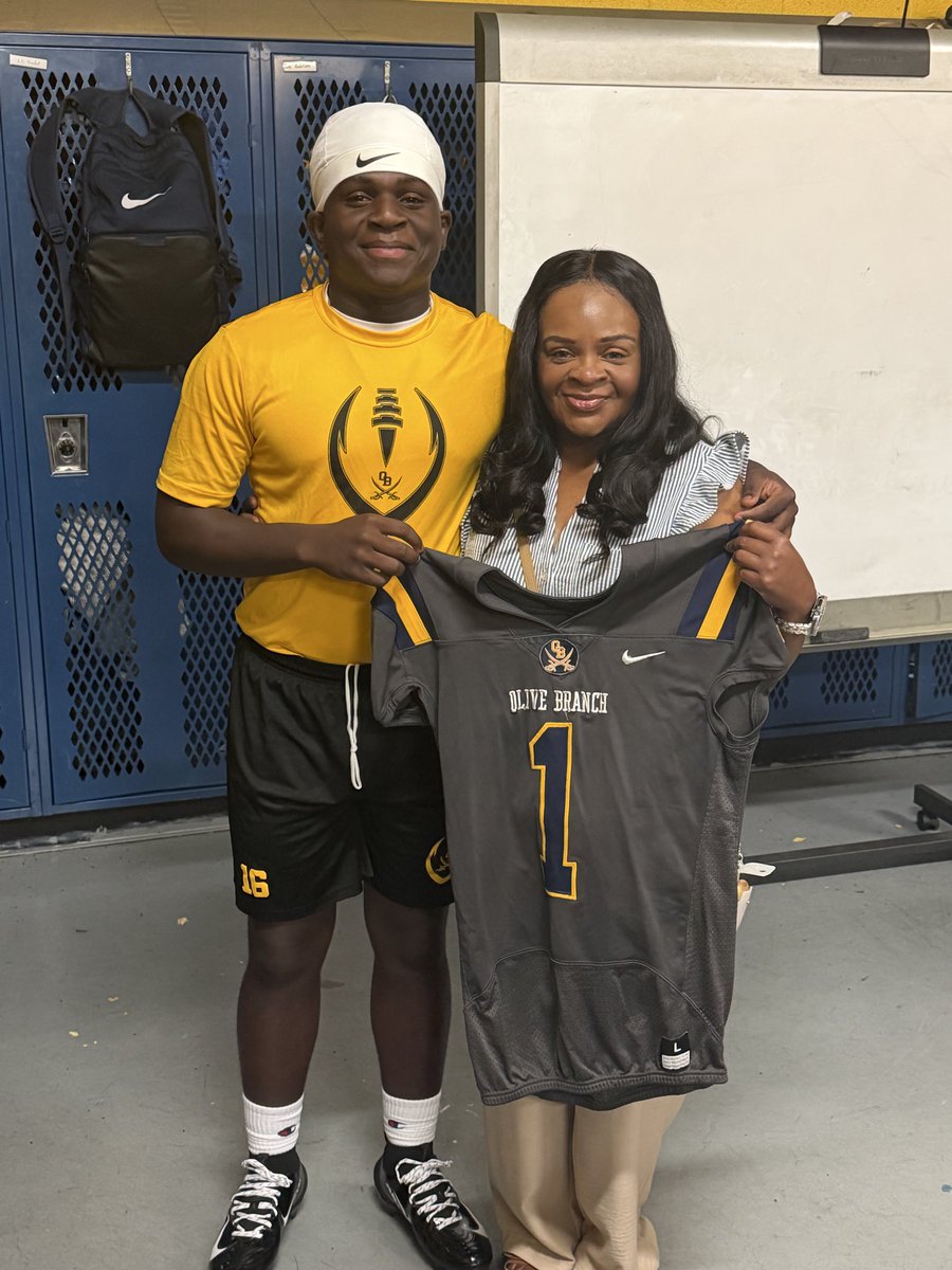 OB_football's tweet photo. We’re starting a new tradition for the Jersey #1. It goes to the player that’s a hard worker, leader, great teammate, selfless, &amp; just overall great person! With that being said, I give you #1 Ashton Curtis @ashtoncurtis26 with a surprise presentation by his mom! Congrats Ashton! https://t.co/sE05lPPyey