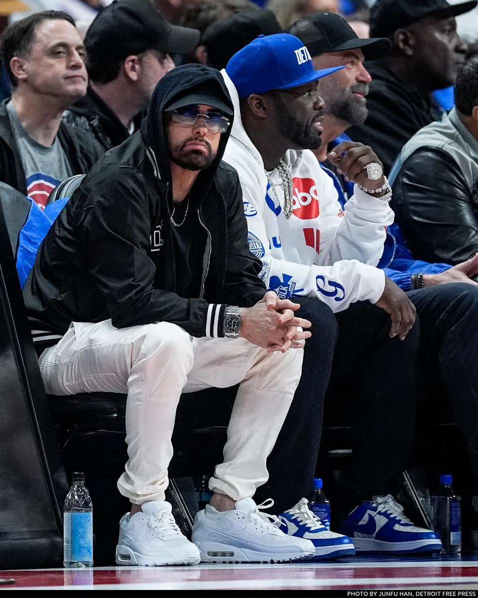freep's tweet photo. Rappers Eminem and 50 Cent sit courtside to watch the Detroit Pistons take on the Cleveland Cavaliers in Game 5 of the Eastern Conference Semifinals on May 13, 2026 at Little Caesars Arena in Detroit. 

📸 Photo by @junfuphoto. https://t.co/Onf1p2I26q