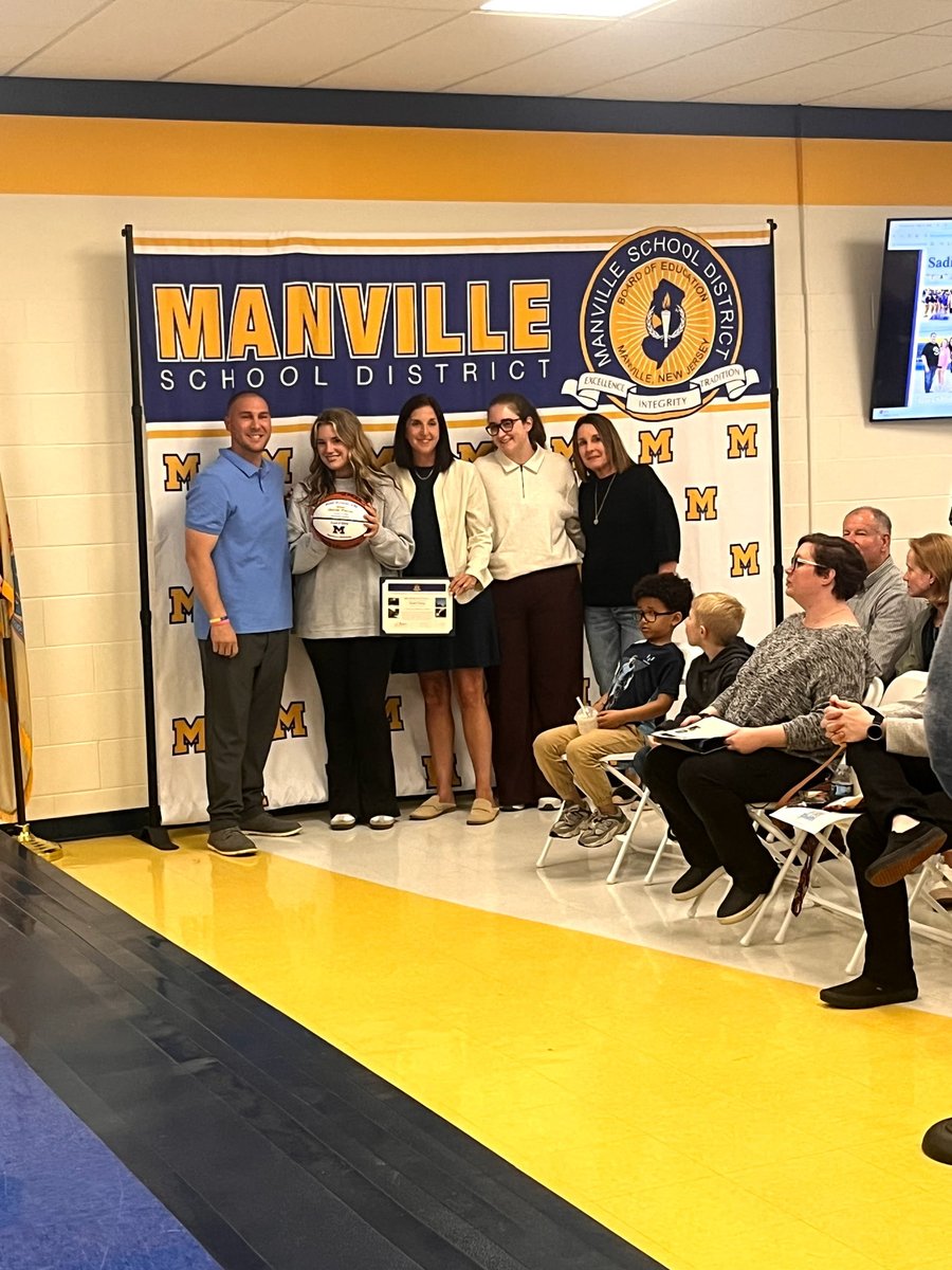 Manville_Gbball's tweet photo. At the Board of Education meeting tonight, Sadie Fleming was awarded her 1000th point basketball to cap off her great career at Manville! Congratulations Sadie! 💙🏀💛 https://t.co/PR2BLKeJqW