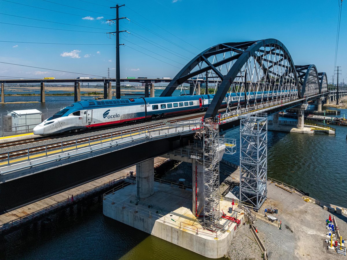 Amtrak's tweet photo. New train 🤝 new bridge. 

Check out our NextGen Acela fleet traveling over the Portal North Bridge. 

When new trains travel on new infrastructure, the result is an enhanced customer experience – thanks to a smooth ride, use of modern technology, and the incredibly hard work of our teams and partners.