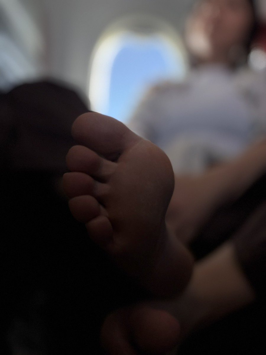 DivineArchM's tweet photo. Mile high foot tease at 30,000 feet ✈️💜  

These purple toes just spent hours in heels and now they’re finally free… resting against the window while we fly back to Mallorca.  

Imagine being in the seat next to me- staring, desperate, knowing you can’t touch.  

Would you drop to your knees in the aisle and worship them right here? Or would you wait until we land so you can clean every inch with your tongue?  

Tell me exactly what you’d do for these plane feet 👅  
First $15 tribute in bio gets priority attention + personal voice note from 10,000 meters up 😈  

#FootFetish #Findom #Femdom #MileHighClub #SweatyFeet #SoleWorship #PurpleToes #TravelTease #Paypig #GoddessFeet #TeaseAndDenial #FootSlave #MallorcaGoddess

@rt_feet @findompromox @FeetFinder @PiggyPayouts @rt_domm @HSoless @rtsubbi @promocucky
