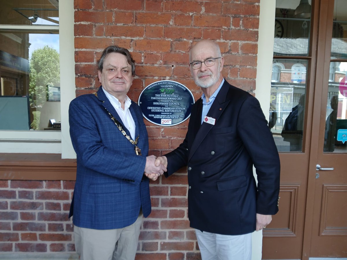 NRHAwd's tweet photo. On Wednesday May 13th Andy Savage, @Taliesin2000 Chair of the Railway Heritage Trust, and Duncan Borrowman, Chairman of @ShropCouncil, unveiled the @NRHAwd @bamukandireland Partnership Award plaque for the magnificent restoration of Oswestry Station, now the home of @CambrianChr https://t.co/CeLqyO3Ip7