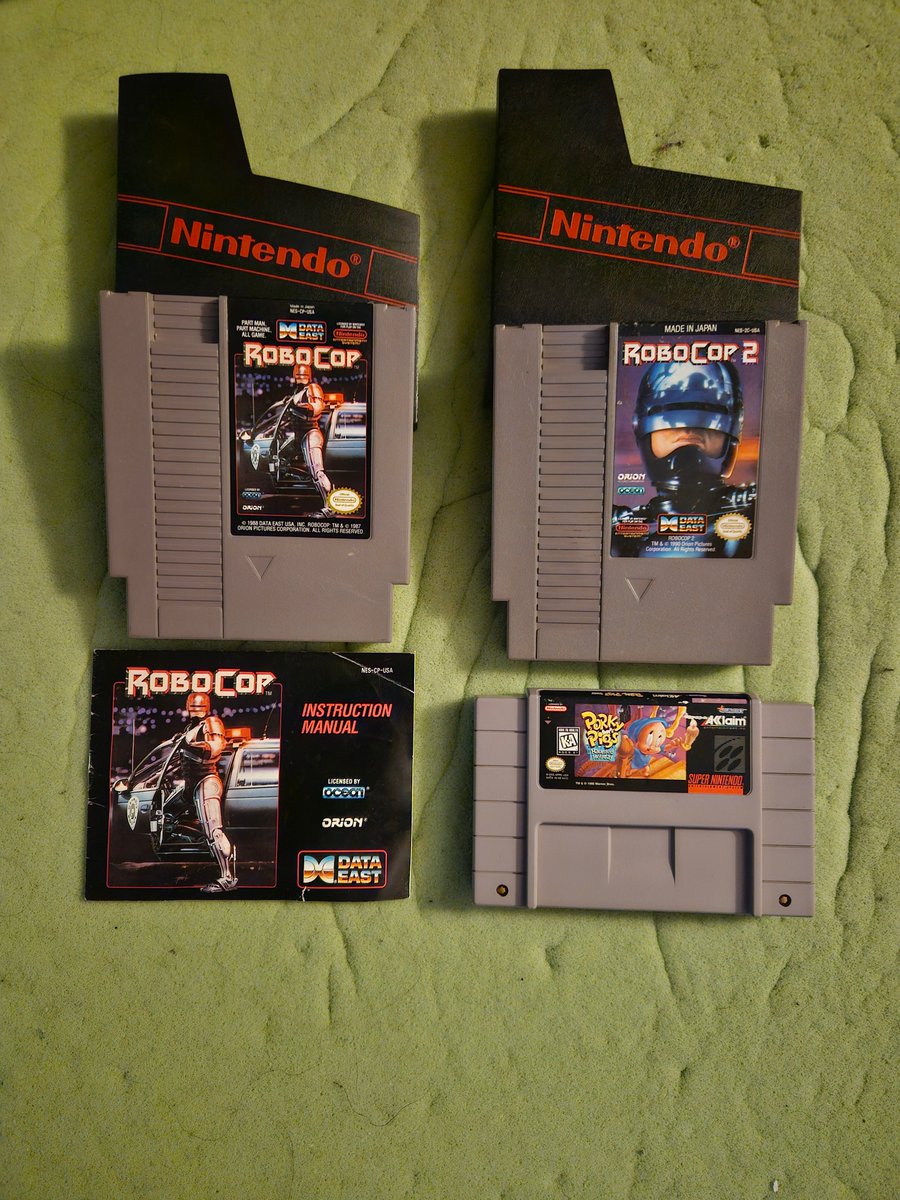 316Glock's tweet photo. Here are some of my retro additions to my current library: Robocop/1987/NES w/manual, Robocop 2/1991/NES, and Porky Pig's Haunted Holiday/1995/SNES. #MyRetroAdditions #RetroGaming #RetroCollection https://t.co/BwXLFLQisw