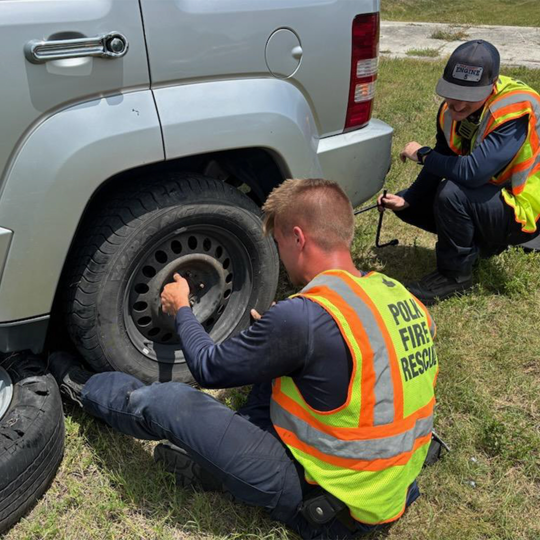 PolkFire's tweet photo. Polk County Fire Rescue crews recently treated and transported a sick child after a mother’s tire blew out while driving to the hospital. The mother was worried about getting her car home after crews transported the child, but PCFR staff were quick to help out. https://t.co/LJnj3EYcEj