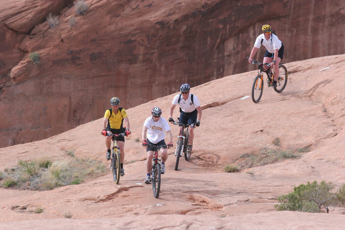 UtahGovOps's tweet photo. From @UtahArchives: 
May is #BikeMonth! 🚵This photo shows former Utah Governor Jon Huntsman Jr. mountain biking during a visit to Moab in 2006. Learn more about him, and explore records from his administration: https://t.co/7dauaX0t9B https://t.co/eprrsH2vle