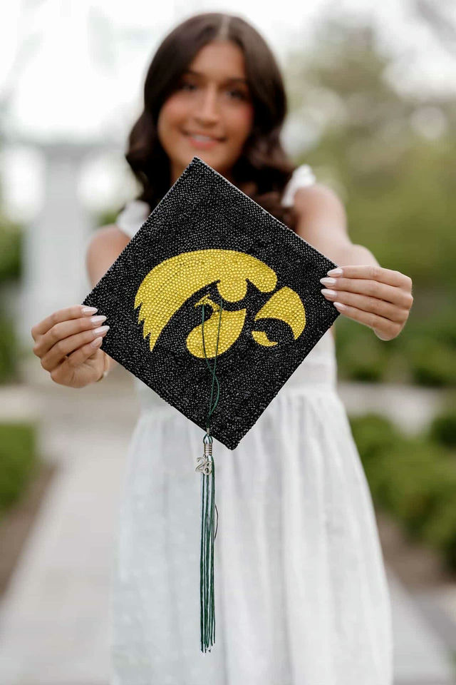 IowaAdmissions's tweet photo. The future starts in black and gold.🎓 https://t.co/XUHvtUavKT