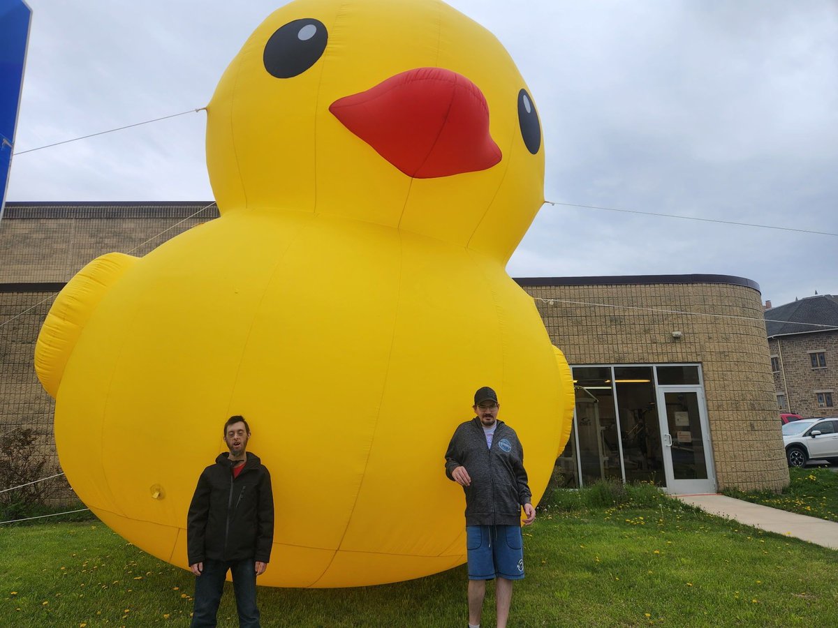 ValComScvs's tweet photo. Our CPS staff were out walking around Johnstown for some community outings when they encountered this gigantic duck! 

Along with the largest rubber duck returning to Pittsburgh earlier this spring,  they span the whole region! #SupportingPeople https://t.co/2sZ1apHggg
