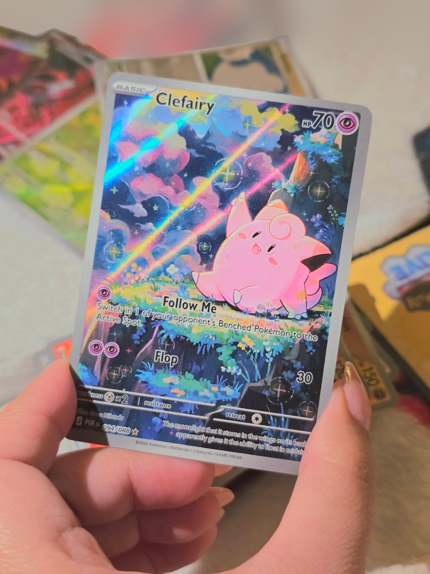 twirlicozy's tweet photo. omg puppy luck??!! i looove this rowlet &amp; clefairy card 😭✨ https://t.co/3k3hT4U1NW