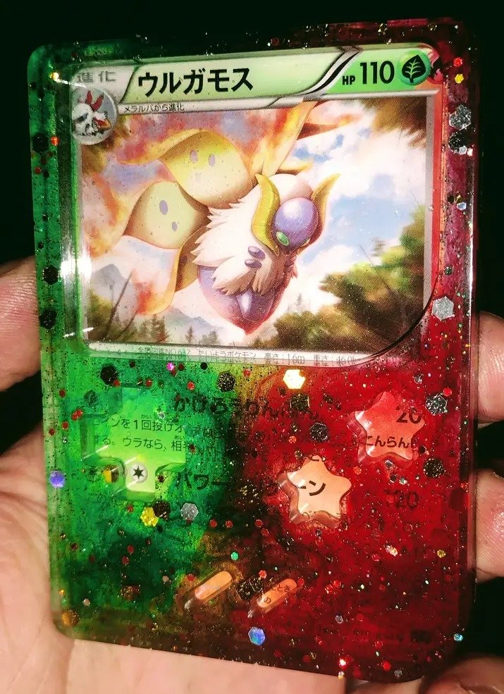 The first Pokemon TCG Card Shaker I handmade awhile back a Japanese Duel  Type 1st Edition Shiny Volcarona Gameboy Pokemon Card Shaker.