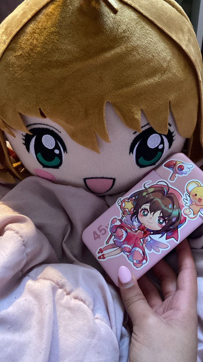 Decided to make my new portable charger card captor Sakura themed