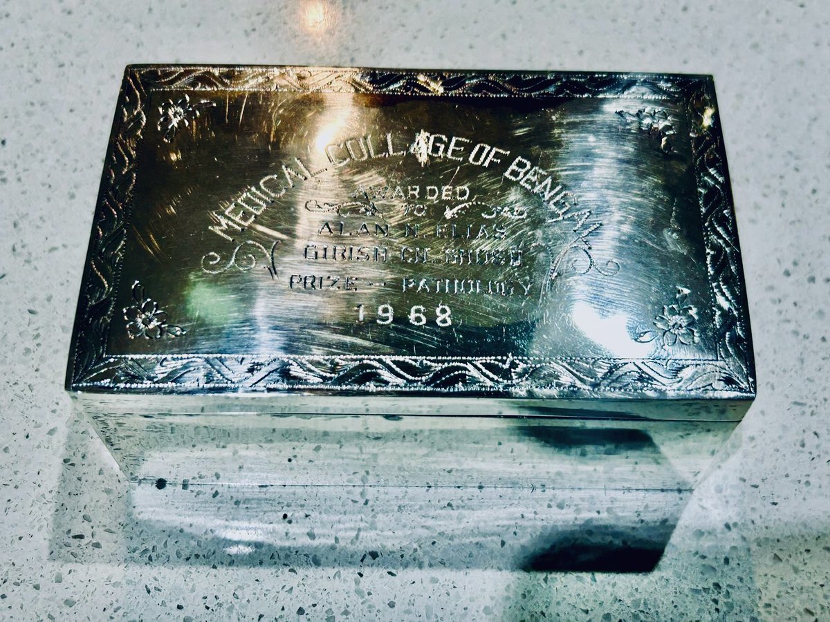 ocmaff's tweet photo. This beautiful pure silver prize box always makes me laugh 😂
Awarded to Dr. Alan N. Elias in 1968 for the Girish Ch. Ghosh Prize in Pathology at the Medical College of Bengal (University of Calcutta).
They engraved “COLLAGE” instead of “COLLEGE”… and the clumsy scratch-out makes the mistake even funnier!
Professor Emeritus Alan N. Elias, MD (UC Irvine) — who swept gold medals and awards throughout his years there — also holds Canadian Royal College credentials.
Part of our family “pyramid” of treasures ❤️🥇🏆