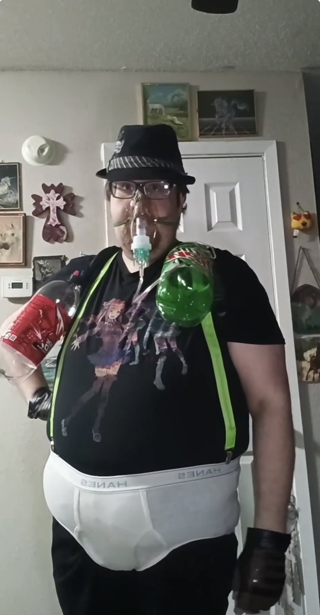 BoomBoxPanda's tweet photo. Generate an image of a mortal kombat character based on this man. Standing in a level that is logically themed to himself https://t.co/XSWXYE0eEE