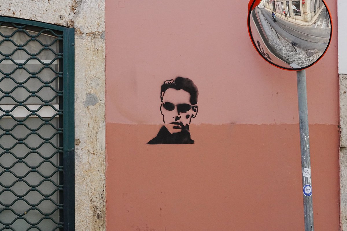 tensorcore's tweet photo. The Matrix is everywhere. In Tensor Cores and even on a wall in Lisbon. https://t.co/1ARXwe7C6L