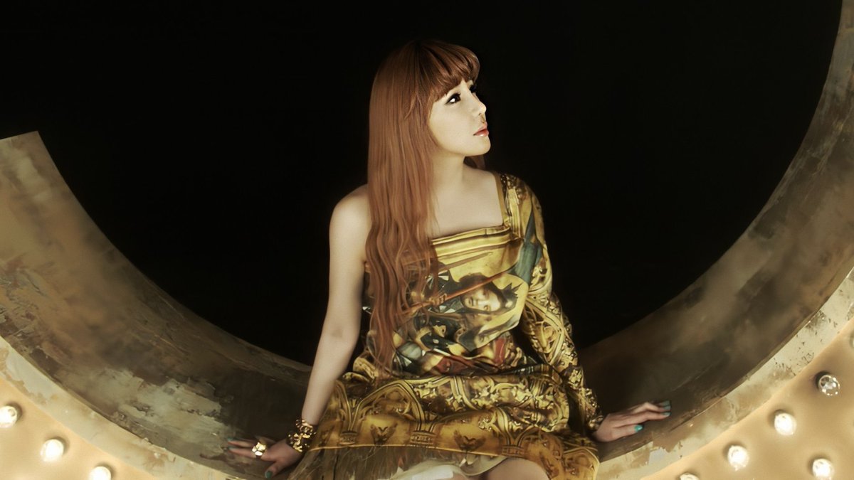 royalparkbom's tweet photo. Park Bom wearing an Alexander McQueen Autumn/Winter 2010 Haute Couture dress in her “Don’t Cry” music video 

The dress originally retailed at $20,000 and is now considered to be worth significantly more, as it is one of McQueen’s rare archival pieces released before his untimely death