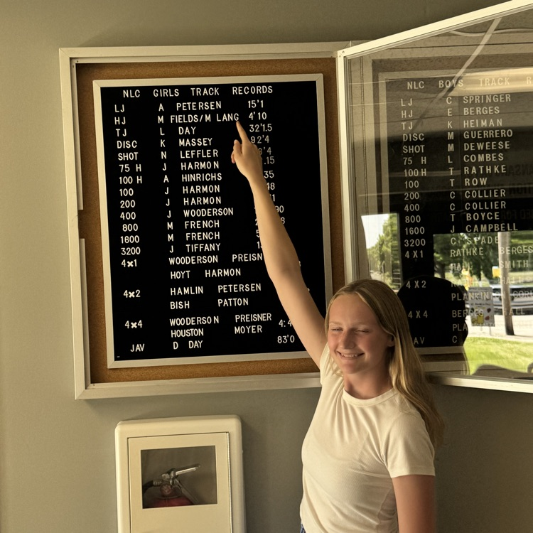 USD251's tweet photo. Meredith Lang adding her name to the record board after she tied the girls high jump record.  Meredith has tied the record with Madalee Fields with a jump of 4 '10'.  Great job Meredith! https://t.co/hp1wplqdjU