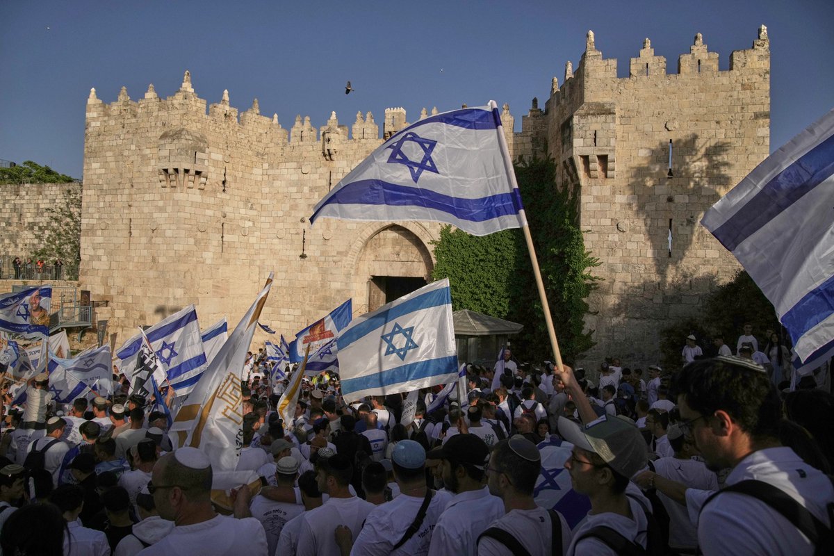DeccanChronicle's tweet photo. #Israelis celebrate near Damascus Gate during the annual #JerusalemDay march commemorating Israel's capture of East Jerusalem in the 1967 #Mideastwar, in Jerusalem's Old City, Thursday, May 14, 2026. (AP Photo/Leo Correa) https://t.co/ipkUnPHK4q