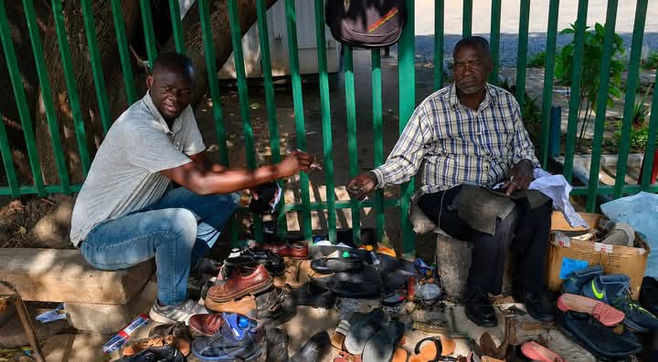 joseph_kalimbwe's tweet photo. Before i left to purse an education at the University of Namibia, I worked as a vendor for Zamtel in the streets of Ndola.

Today i visited Mr. Kaputula whom i worked the streets with. 15 years later, he is still here repairing shoes for a living. He blessed us for the election ! https://t.co/HBMicrOUXy