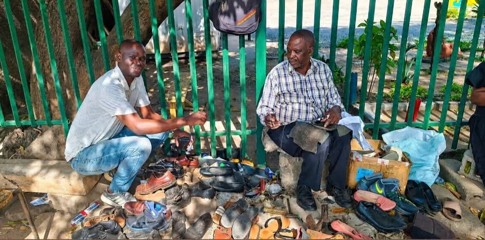 joseph_kalimbwe's tweet photo. Before i left to purse an education at the University of Namibia, I worked as a vendor for Zamtel in the streets of Ndola.

Today i visited Mr. Kaputula whom i worked the streets with. 15 years later, he is still here repairing shoes for a living. He blessed us for the election ! https://t.co/HBMicrOUXy