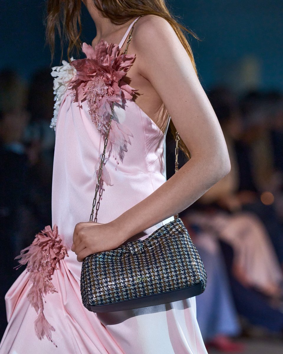 Dior Cruise 2027. Look 5: Icy pink satin caught at the hip with a
