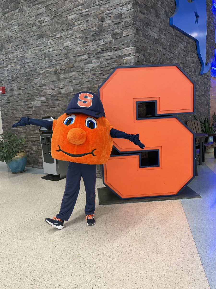 SyracuseAirport's tweet photo. Orange you glad you flew through Syracuse?

Otto the Orange recently touched down at the airport. We’re always happy to show our @SyracuseU and @Cuse pride! From the Dome to the runway, we’re making moves here in Syracuse.

#OttotheOrange #FlySYR https://t.co/1NnCuyyCQz