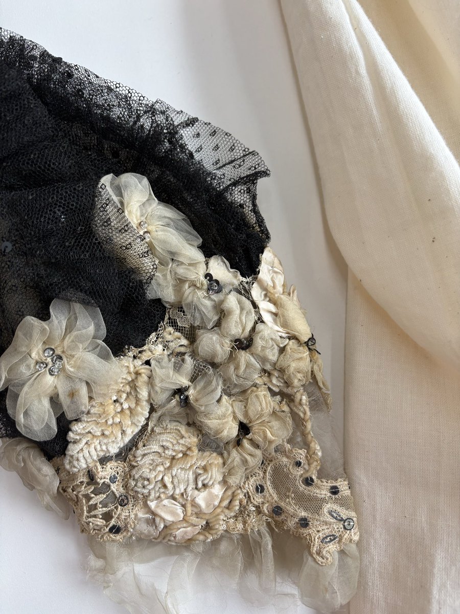 txetxarito's tweet photo. Next project: conserving this beautiful dress. Look at those stunning chenille flowers https://t.co/E6Kv2skuy7